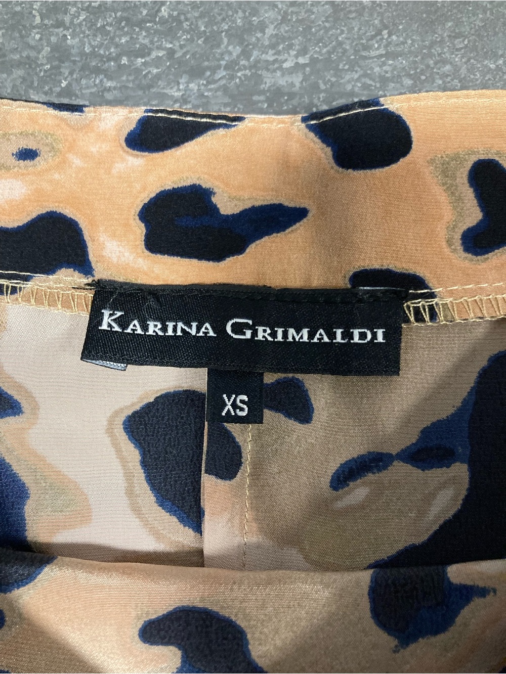 Karina Grimaldi Silk Animal Print high low skirt in Camel, Navy & Black